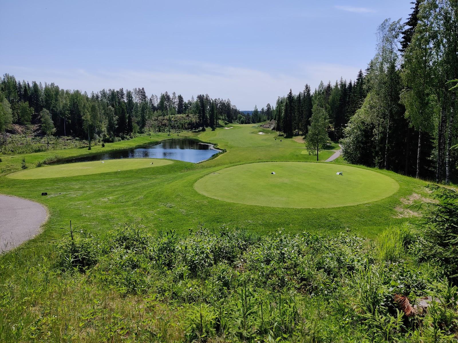 Kytaja Golf near Helsinki, Finland, a forest lined fairway under the long Nordic light