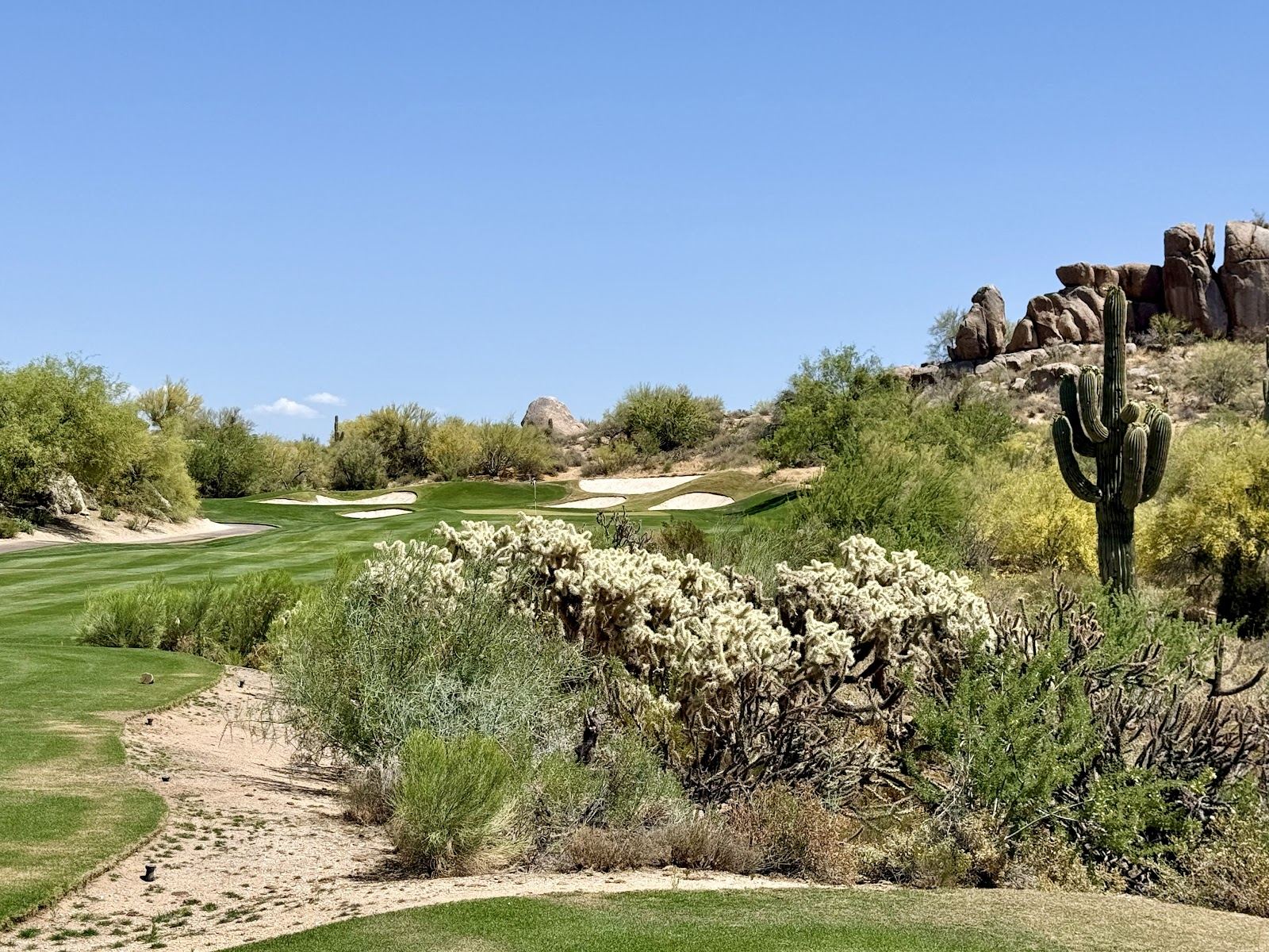 Boulders Golf Club in Carefree, Arizona, desert fairway curling beneath giant granite boulder formations