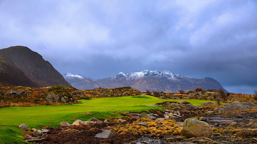 Lofoten Links golf course in Norway under the midnight sun, holes running between granite peaks and the Norwegian Sea