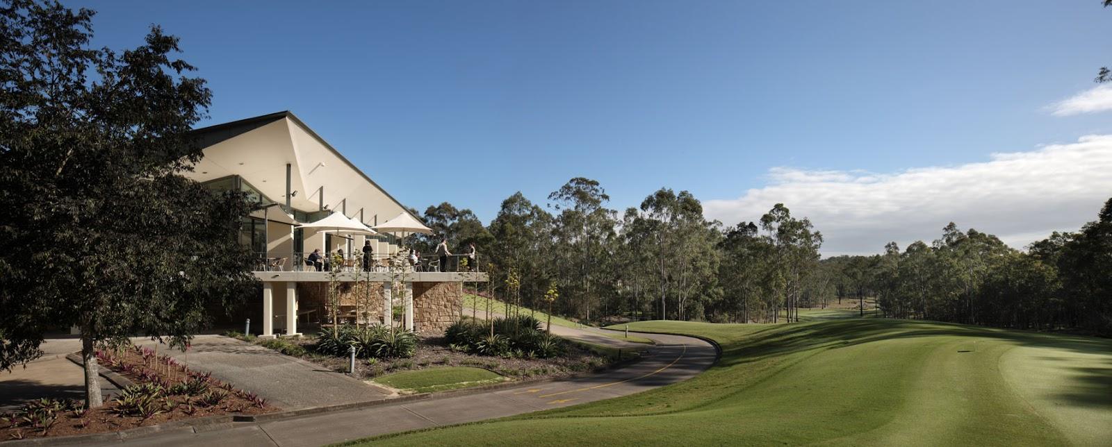 Brookwater Golf Club near Brisbane, a Greg Norman fairway carved through native bushland with sweeping waste bunkers in Queensland