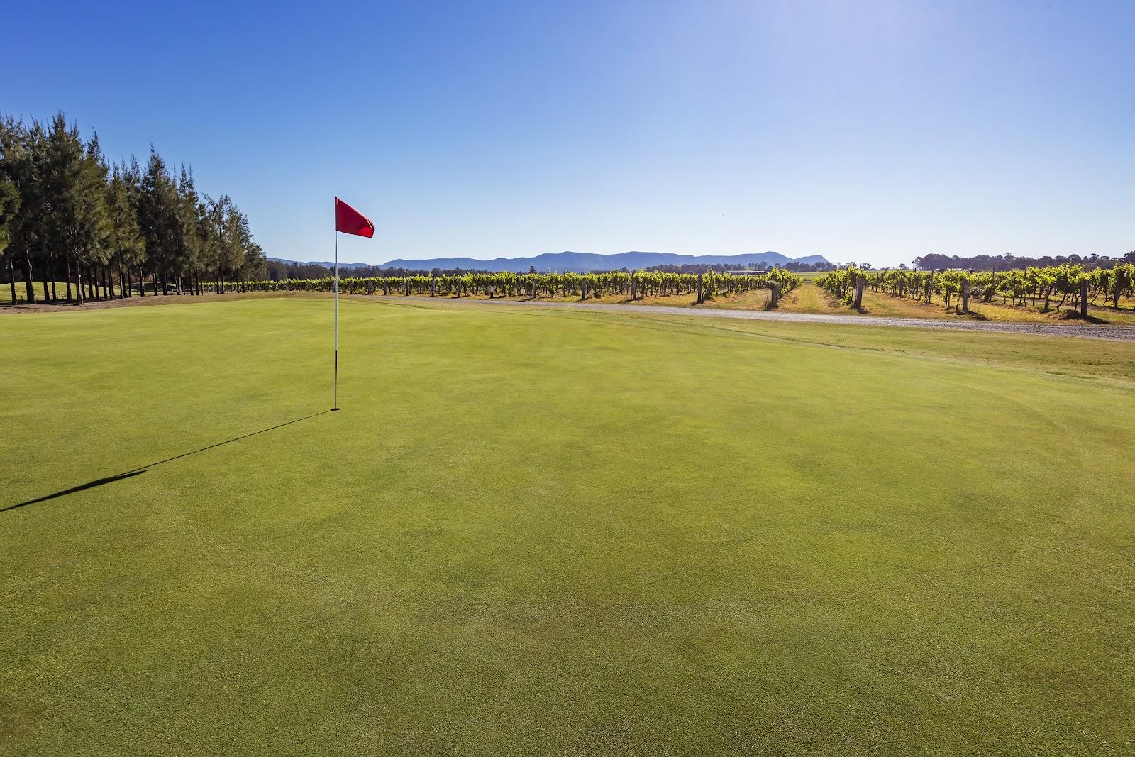 Hunter Valley Golf Club at Lovedale, a parkland fairway with lake and vineyards in the New South Wales wine country