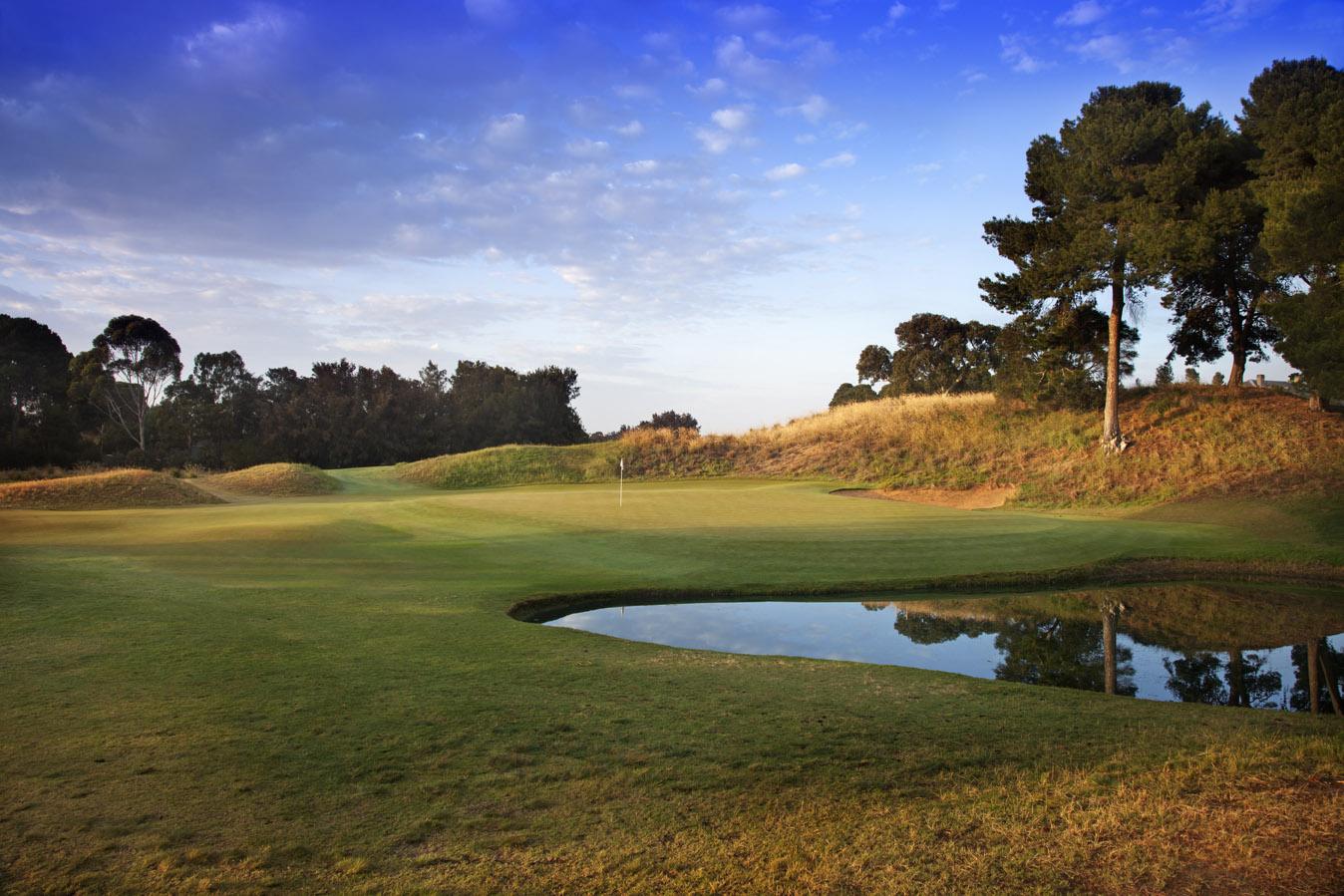 Kooyonga Golf Club, sandy parkland fairway framed by tea tree and bunkering on the Adelaide plain, South Australia