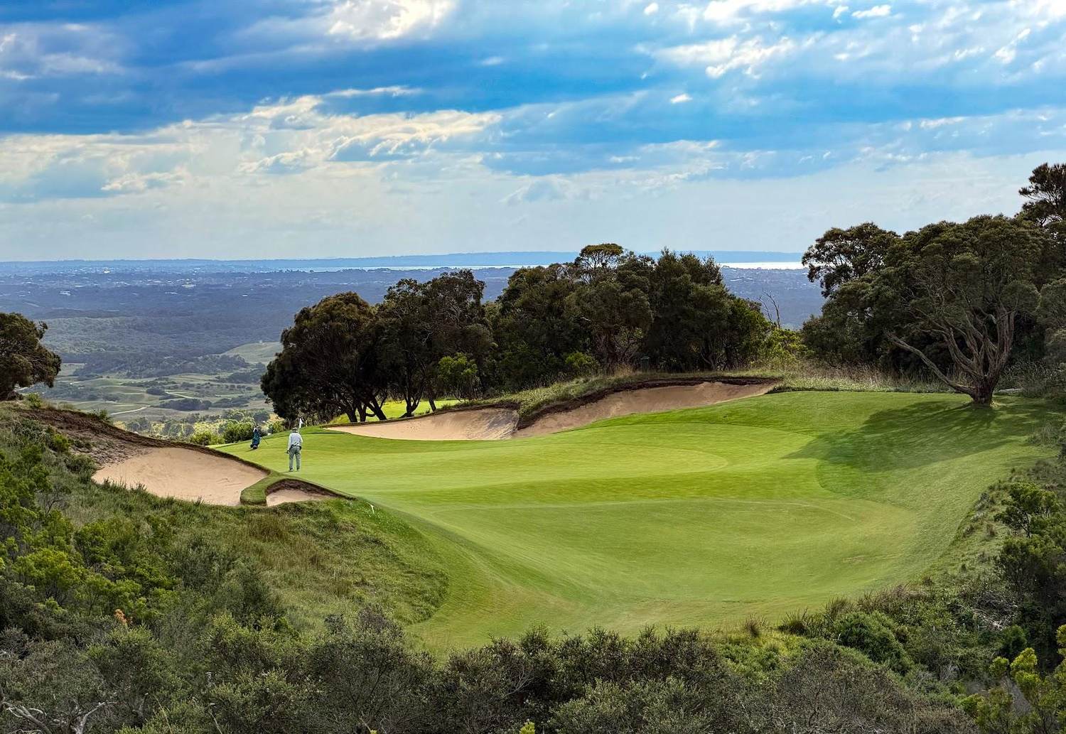 The National Golf Club Old Course, elevated green and bunkers above Bass Strait at Cape Schanck