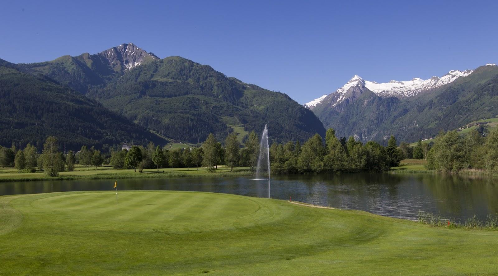 Golfclub Zell am See Kaprun, alpine fairway below the snow capped peaks of the Austrian Alps near the Zeller See