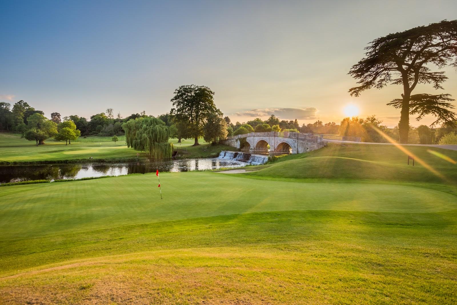 Brocket Hall Melbourne Course, parkland fairway beside the Broadwater lake below the Palladian mansion near Welwyn, Hertfordshire, England