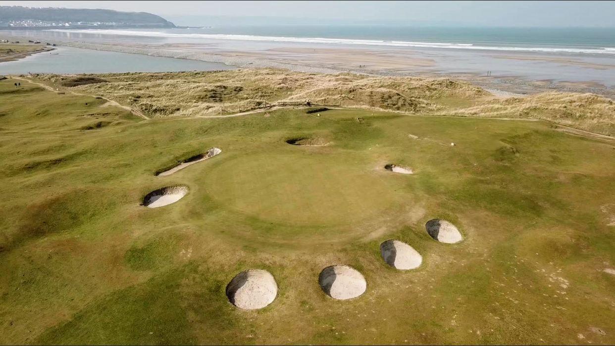 Royal North Devon Golf Club at Westward Ho!, links common grazed by sheep with the Pebble Ridge beyond