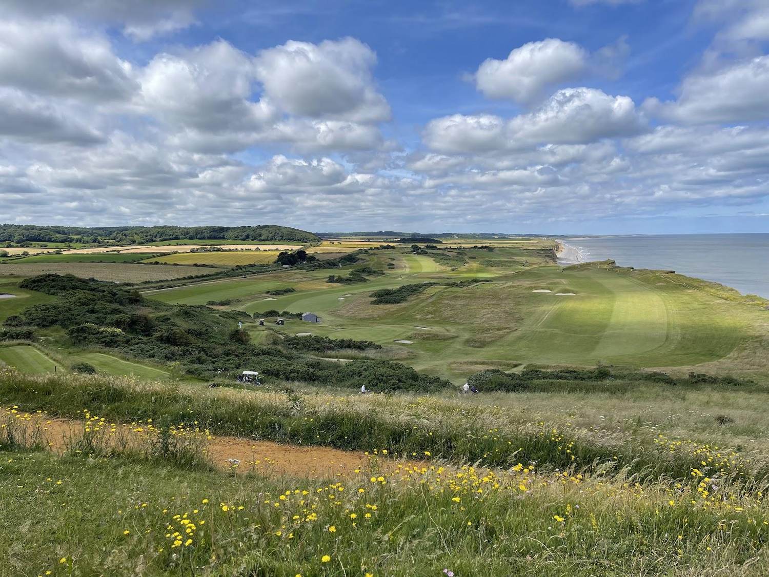 Sheringham Golf Club, clifftop fairway and green above the North Sea in North Norfolk, England