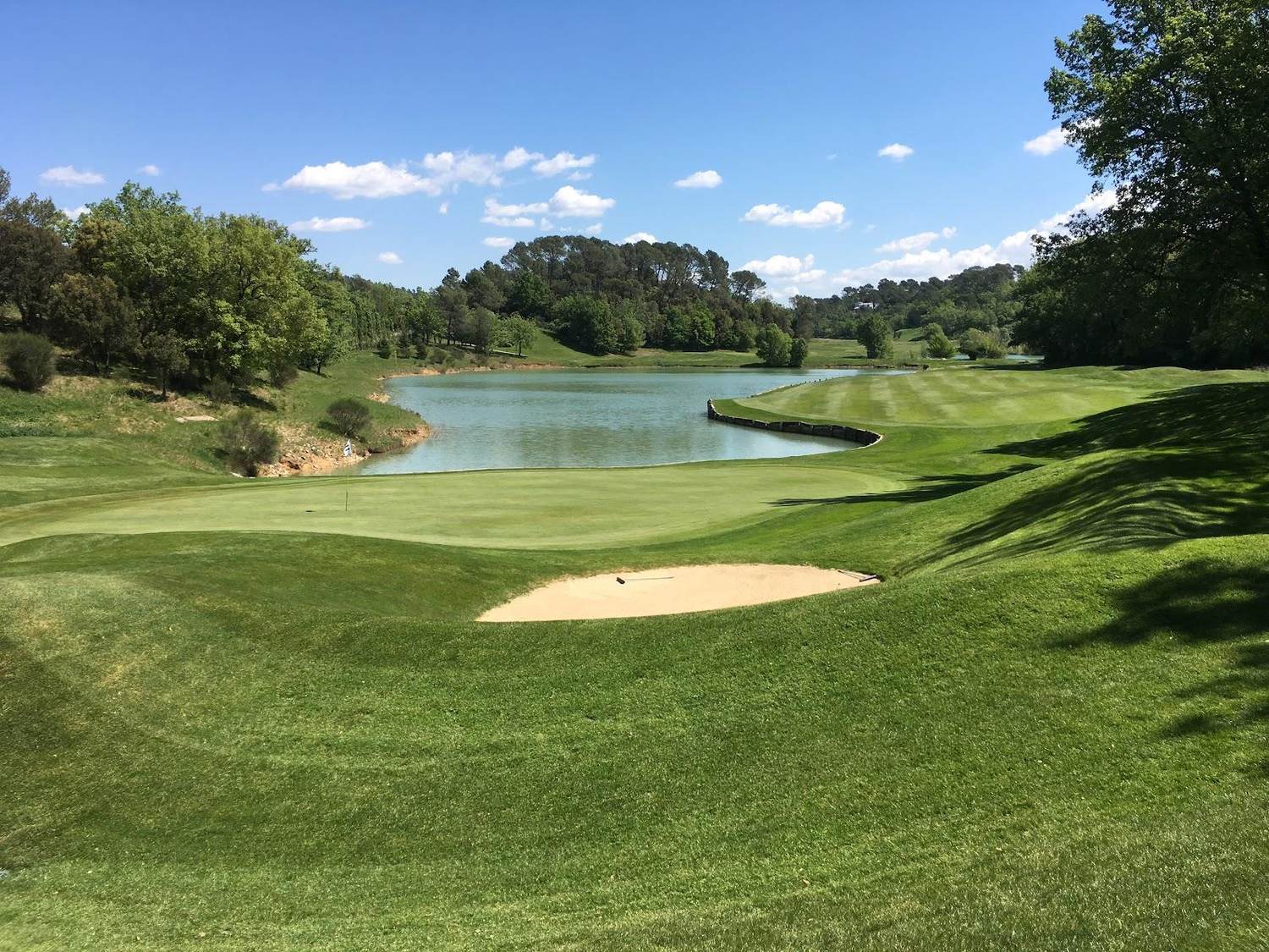 Golf de Barbaroux, wooded Provencal fairway with Pete Dye bunkering near Brignoles in the Var, France