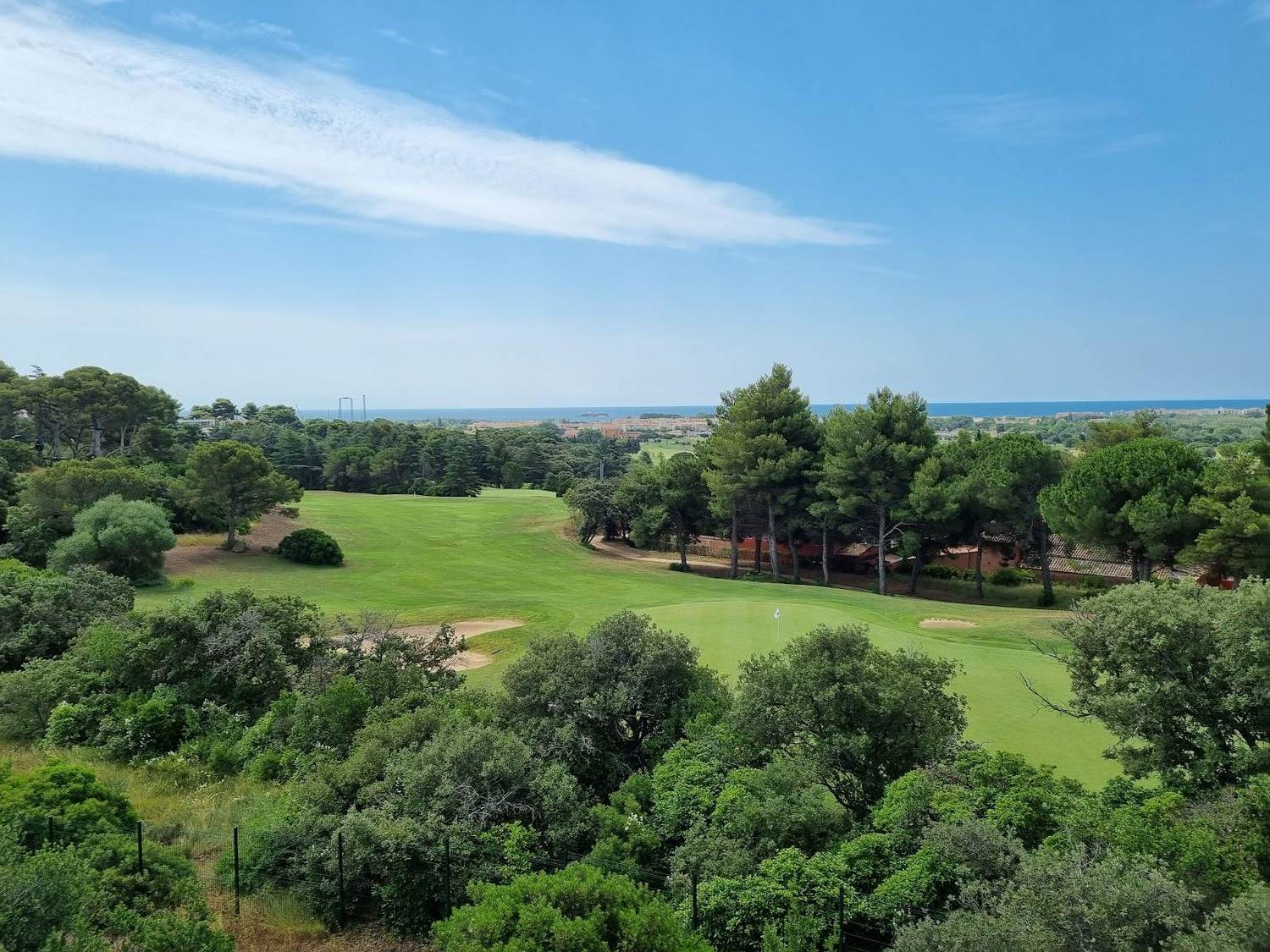 Golf de Cap d'Agde, fairways running beneath the extinct volcano Mont Saint-Loup on the Languedoc coast