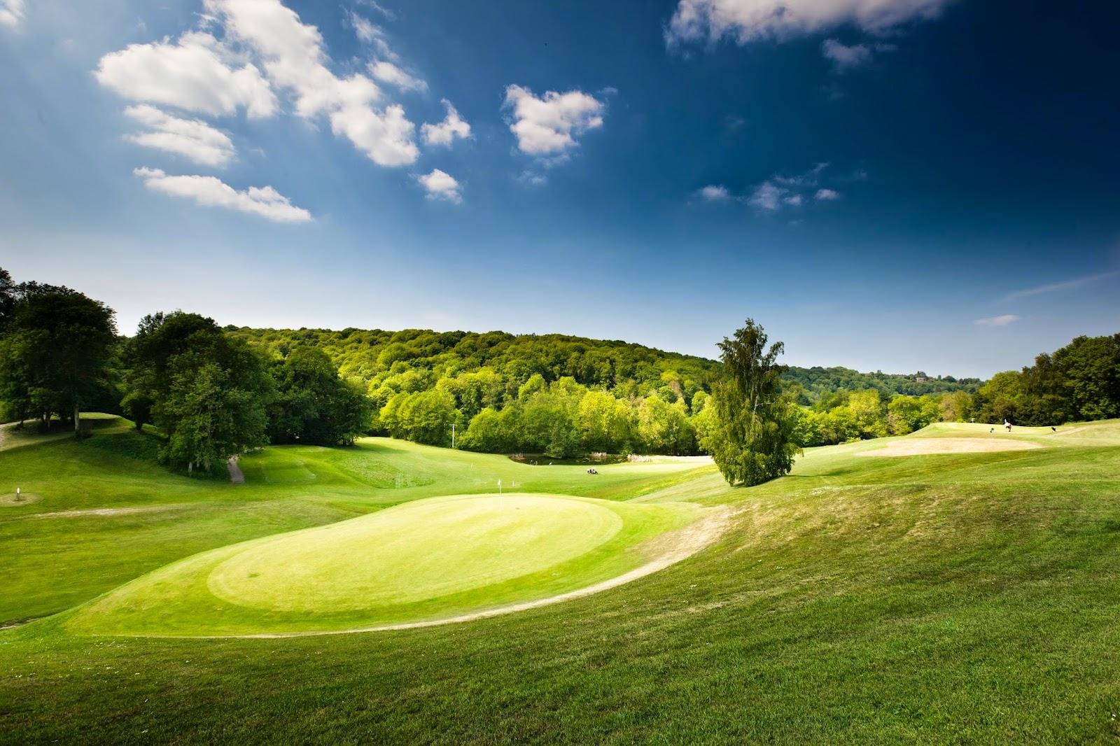Golf de Deauville Saint-Gatien, wooded Pays d'Auge fairway above the Seine estuary in Normandy, France