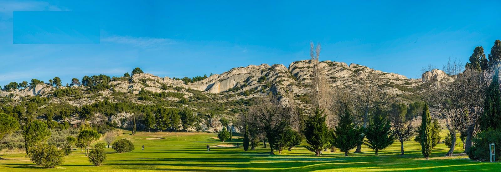 Golf de Servanes, fairways among olive groves and plane trees below the limestone Alpilles in Provence
