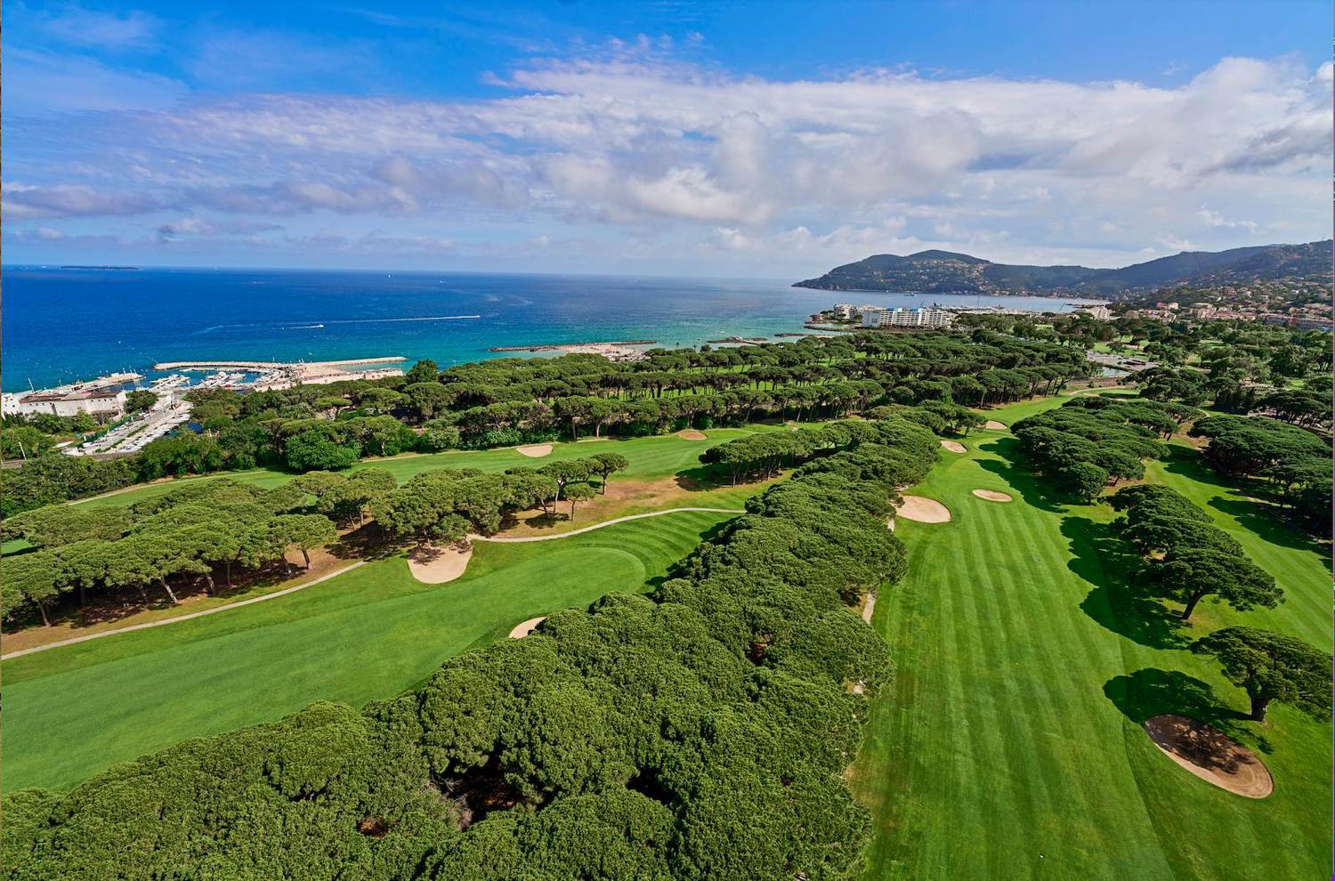 Old Course Cannes Mandelieu, fairway lined with century old umbrella pines beside the Siagne river on the French Riviera