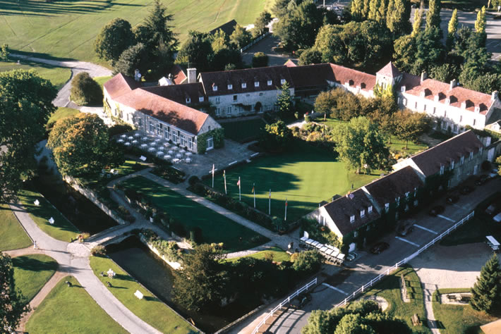 Saint-Nom-la-Breteche Red Course, parkland fairway and clubhouse west of Paris