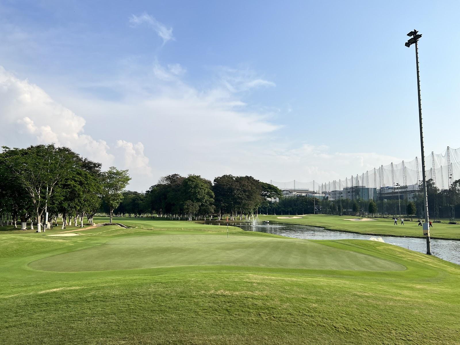 Karnataka Golf Association, mature parkland fairway lined with trees in central Bangalore, India