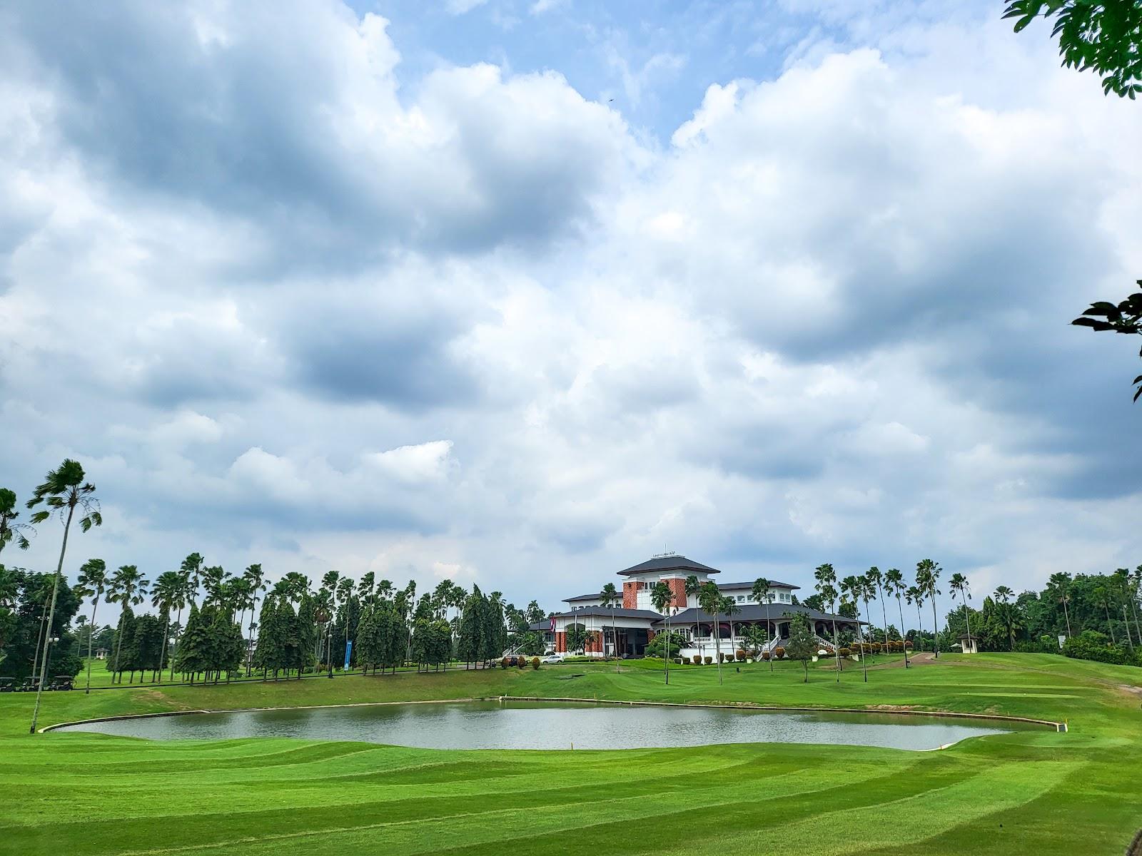Emeralda Golf Club, manicured parkland fairway and lake near Depok, West Java, Indonesia