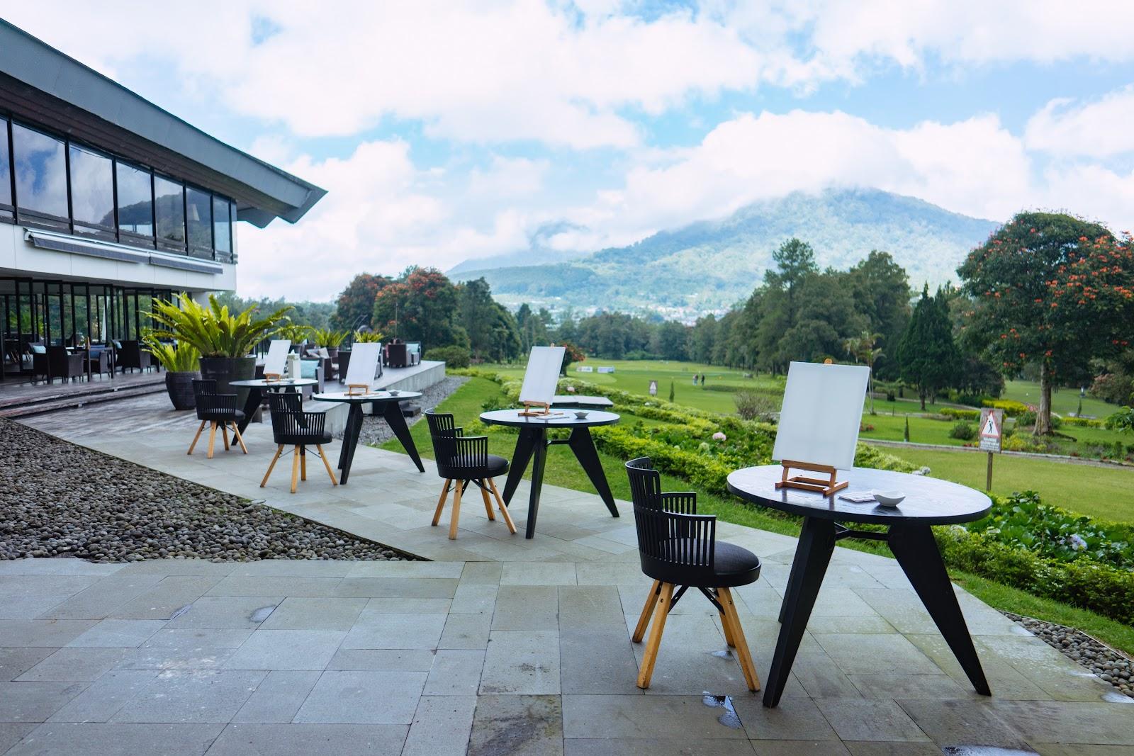 Handara Golf and Resort Bali, fairway inside a volcanic crater ringed by jungle ridges in the Bedugul highlands, Bali