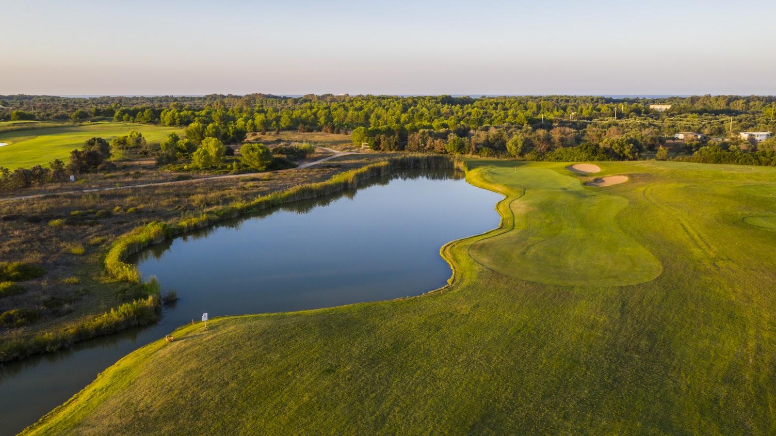 Acaya Golf Club, lake and fairway on the Salento plain near Lecce, Puglia, Italy