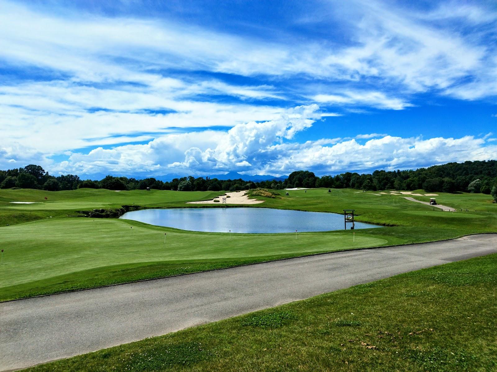 Bogogno Del Conte Course, fairway in a wooded Piedmont valley with the Alps beyond, Italy