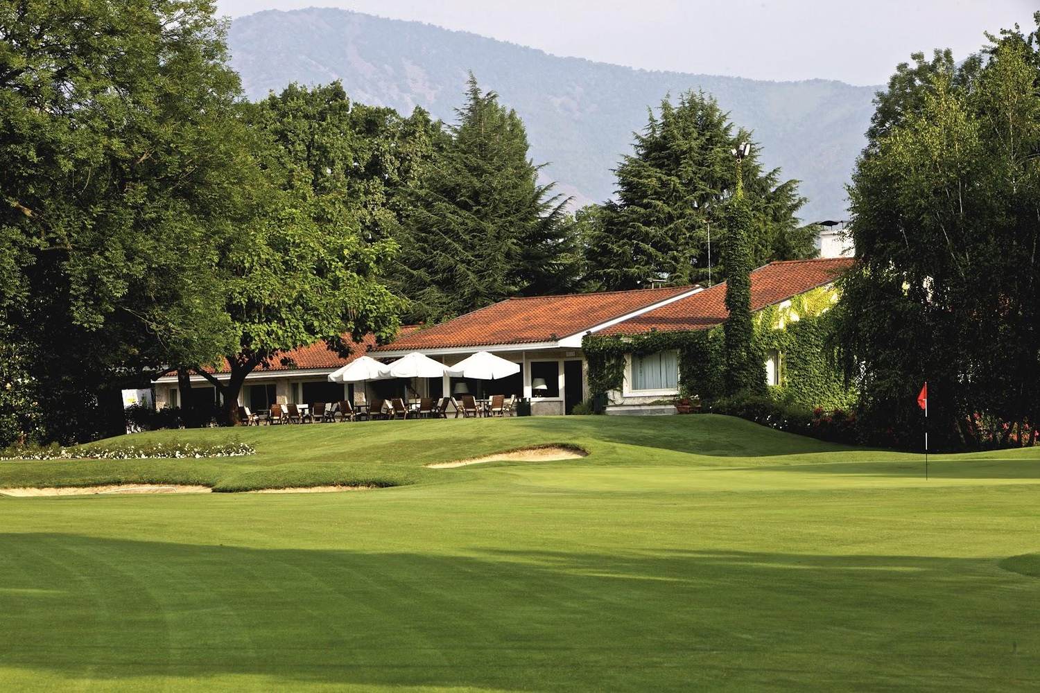 Circolo Golf Torino La Mandria, wooded parkland fairway inside the former Savoy hunting park near Turin, Italy
