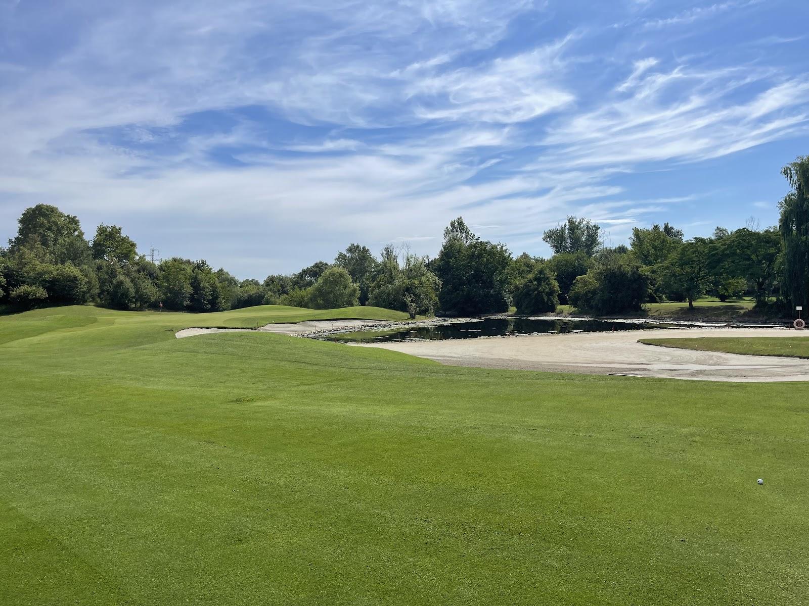 Modena Golf and Country Club, fairway and lake on the Emilia-Romagna plain near Modena, Italy