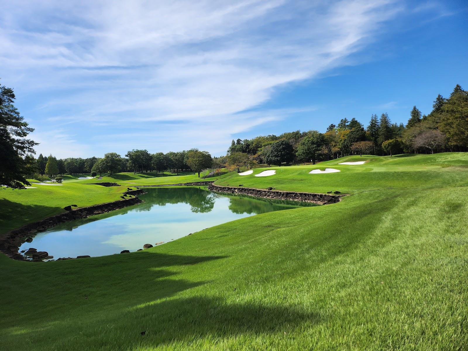 Eagle Point Golf Club, wooded parkland fairway and bentgrass green near Tokyo, Japan