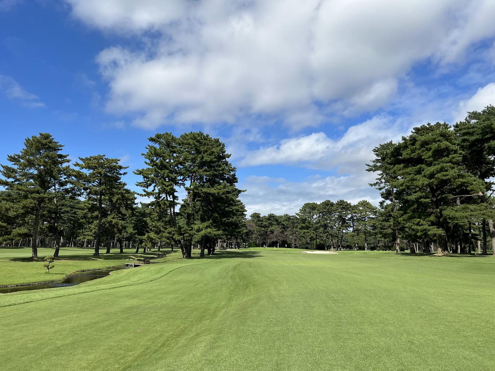 Otone Country Club, pine framed parkland fairway and bentgrass green in Ibaraki, Japan