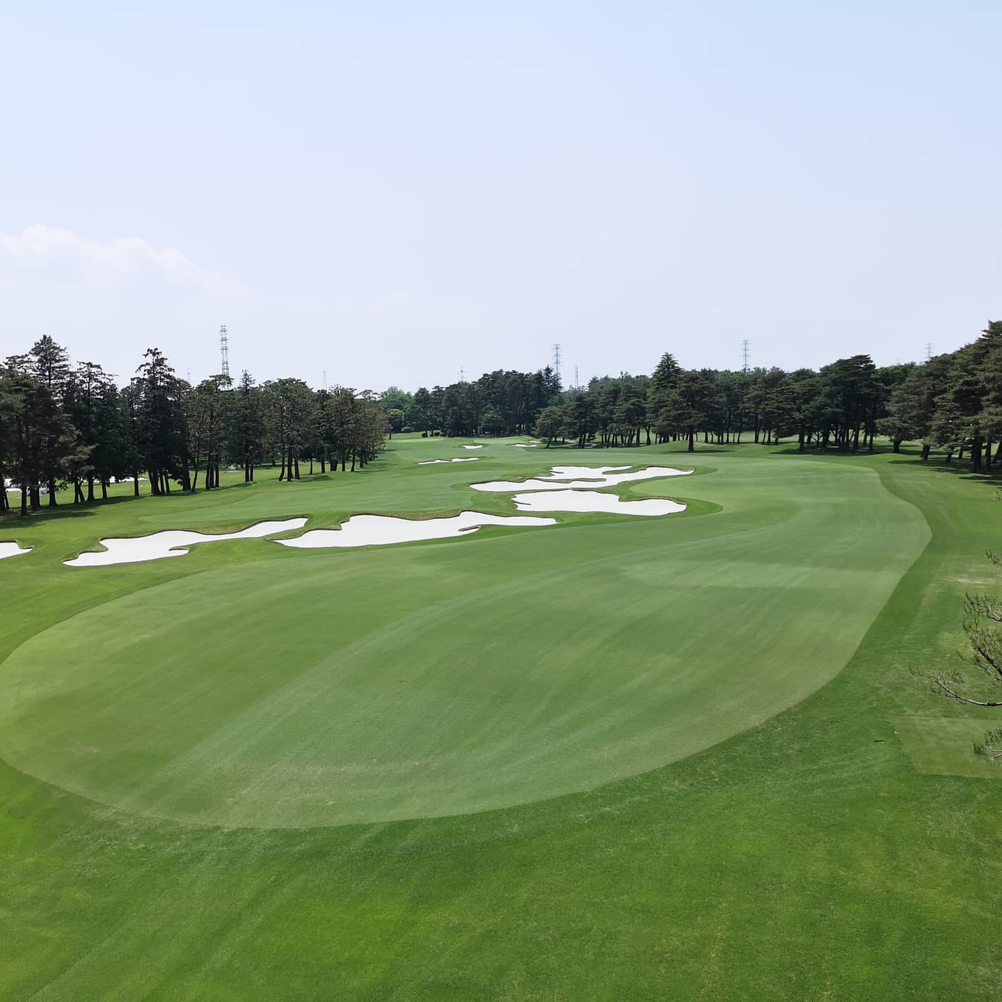 Tokyo Golf Club, parkland fairway and twin green complexes on the Sayama course in Saitama, Japan