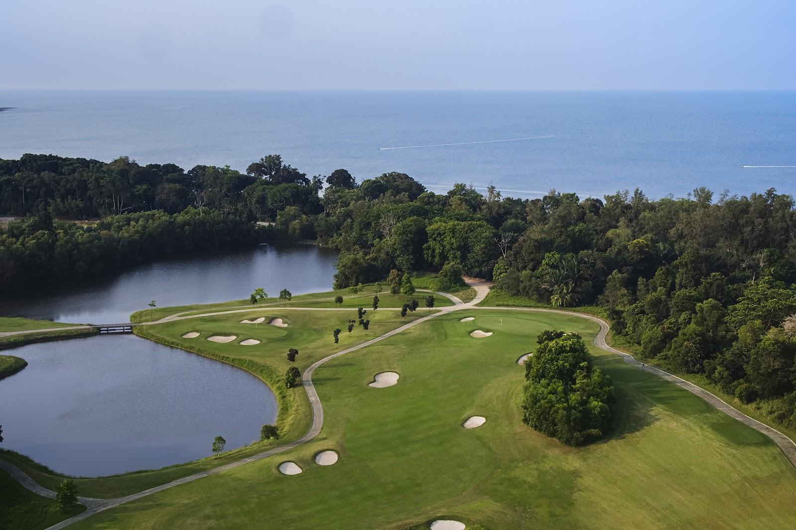 The Els Club Desaru Coast Valley Course, fairway through a forested Johor valley, Malaysia