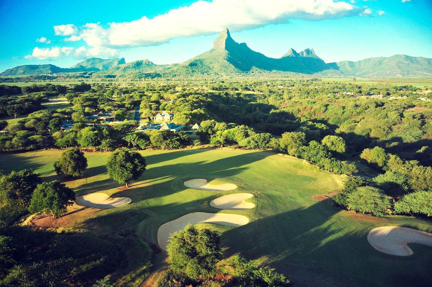 Tamarina Golf Club, fairway above Tamarin Bay beneath Rempart mountain, west coast Mauritius