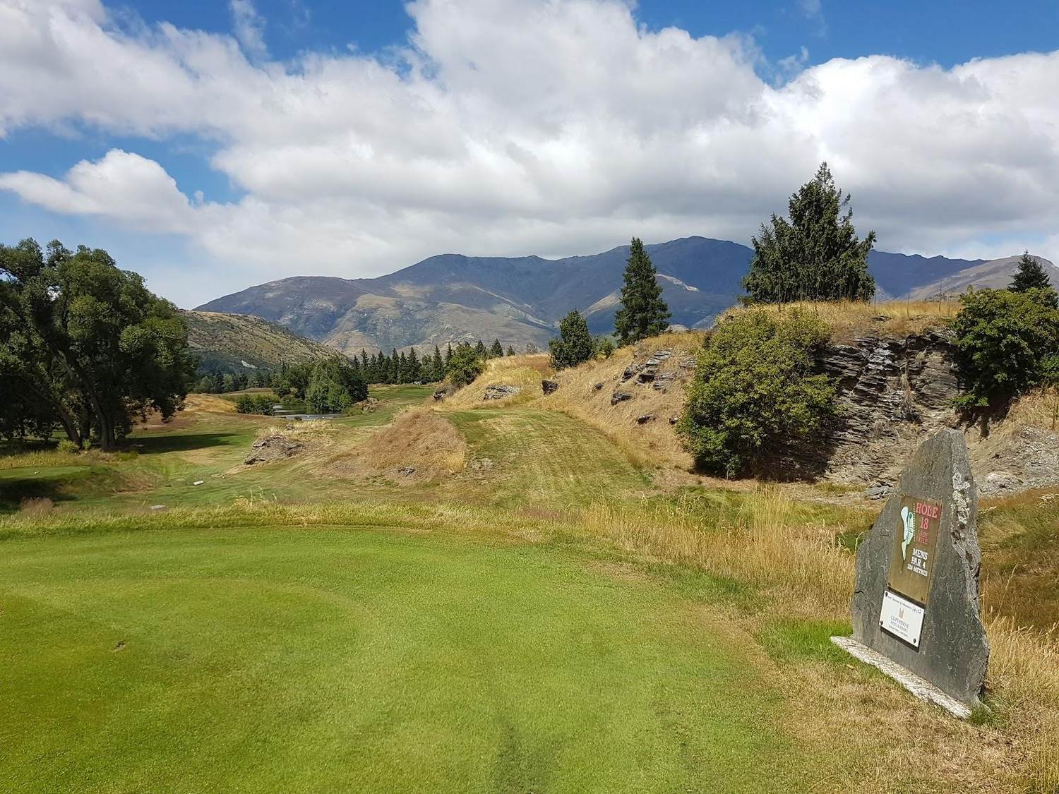 Arrowtown Golf Club, valley fairway framed by mountains near Queenstown, New Zealand