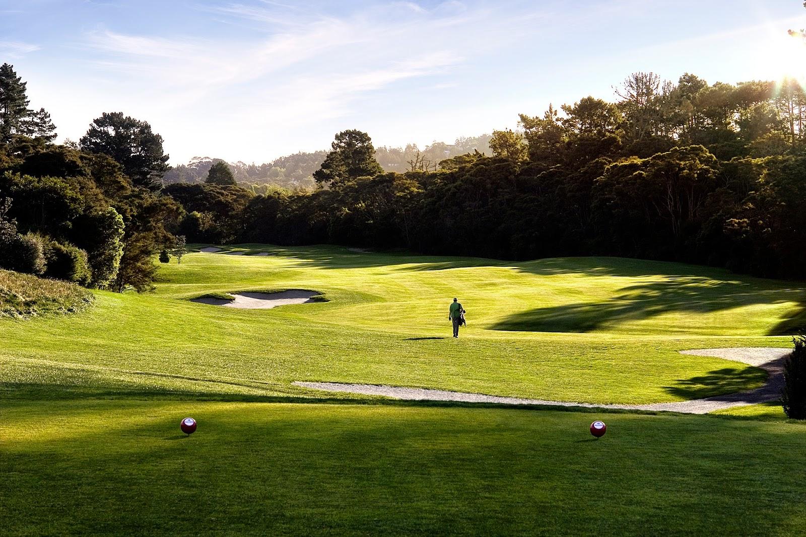 Titirangi Golf Club, rolling parkland fairways framed by mature native bush in west Auckland, New Zealand