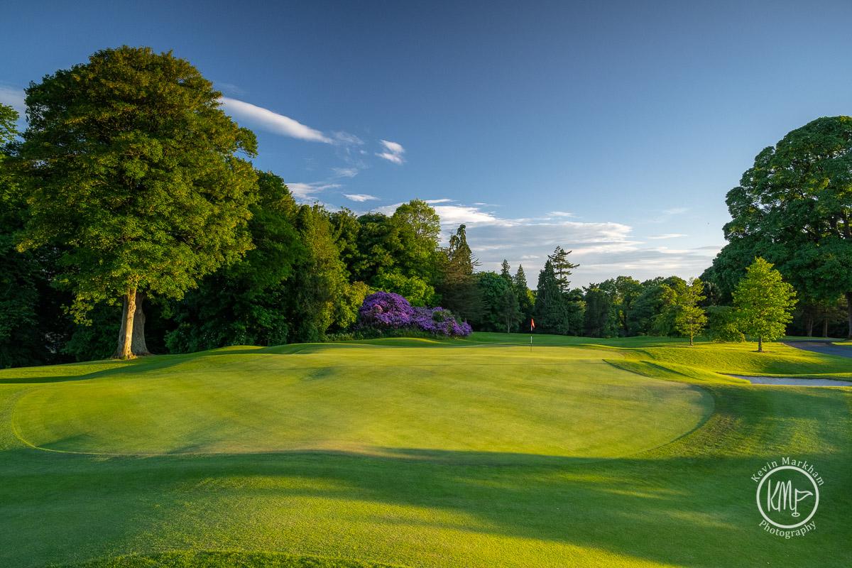 Malone Golf Club, mature parkland fairway beside the trout lake south of Belfast, Northern Ireland