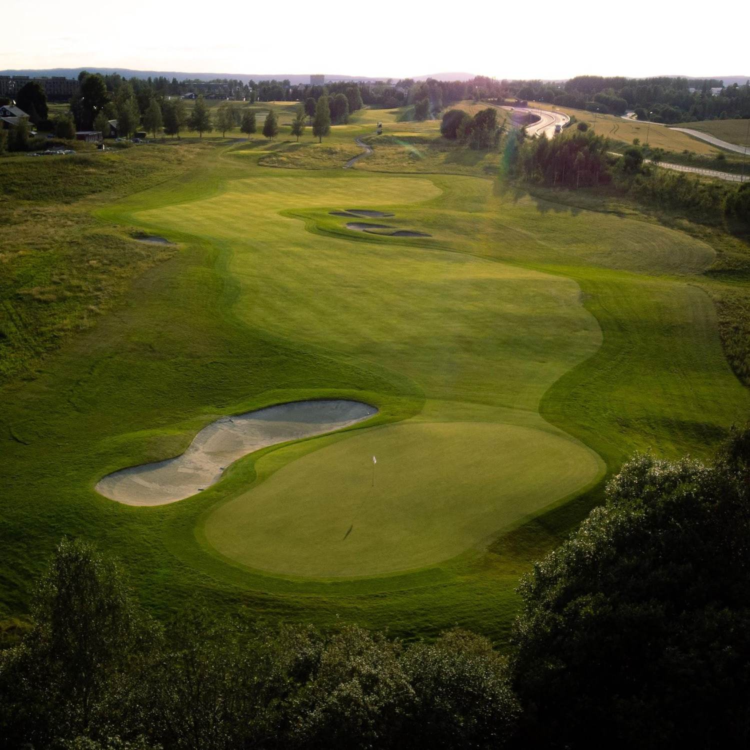 Miklagard Golf, parkland fairway framed by forest near Klofta and Oslo, Norway