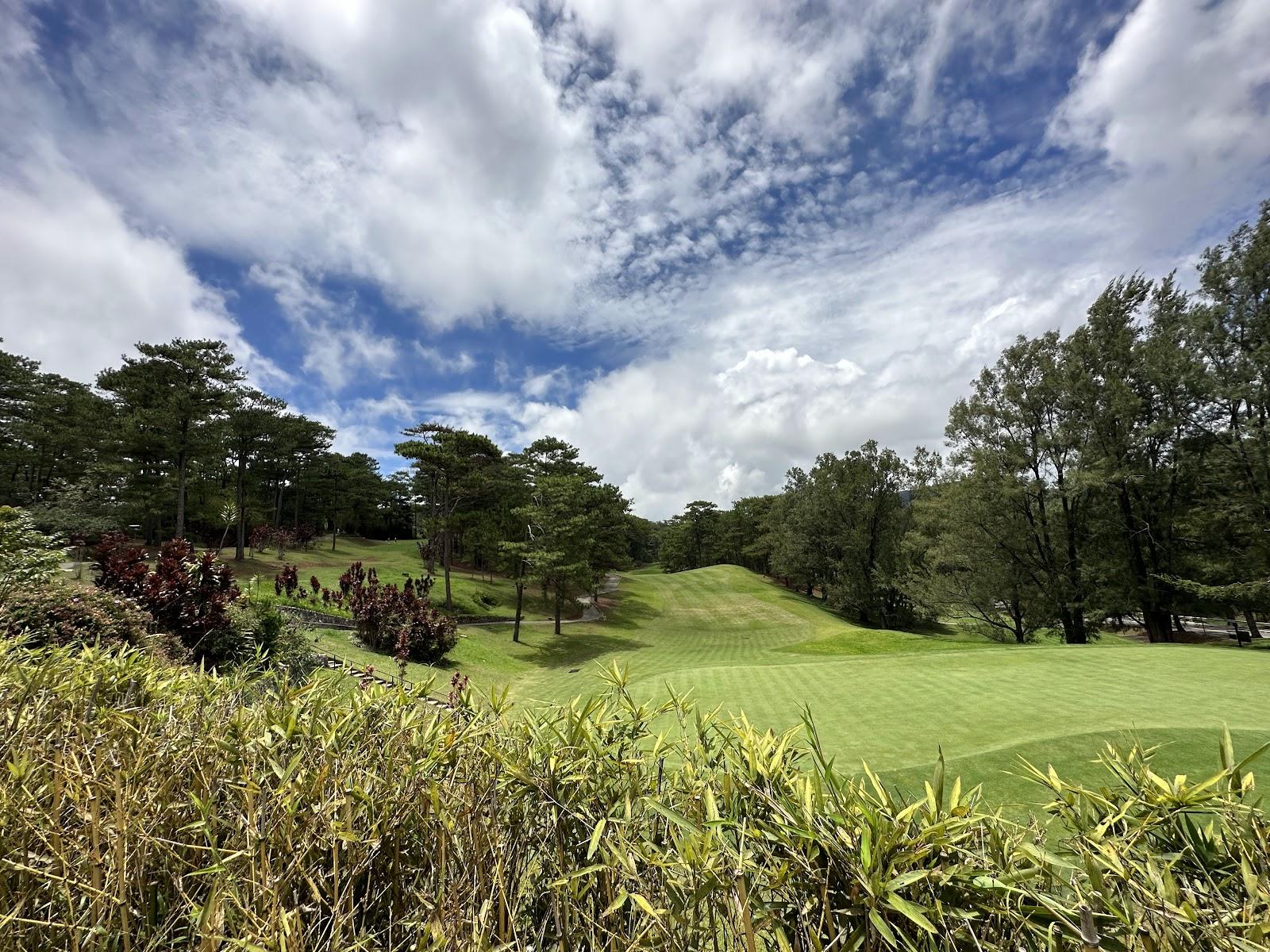 Camp John Hay Golf Club, pine-lined mountain fairway above Baguio, Philippines