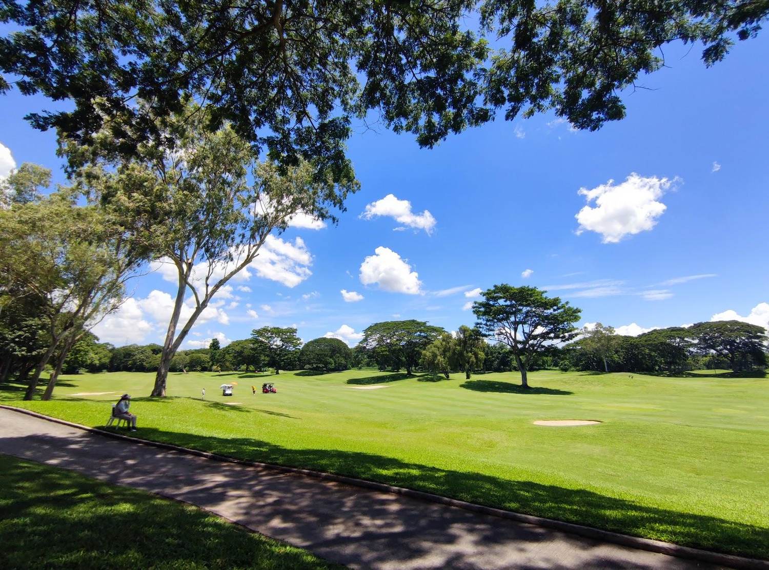 Manila Southwoods Masters course, Jack Nicklaus championship fairway and lake in Carmona, Cavite, Philippines