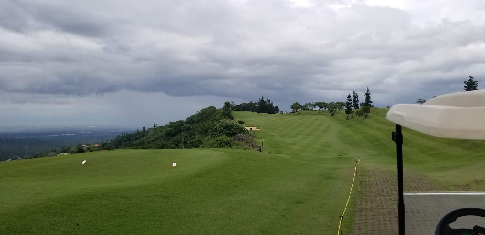 Tagaytay Highlands International Golf Club, mountain fairway with ravines and Taal views, Philippines