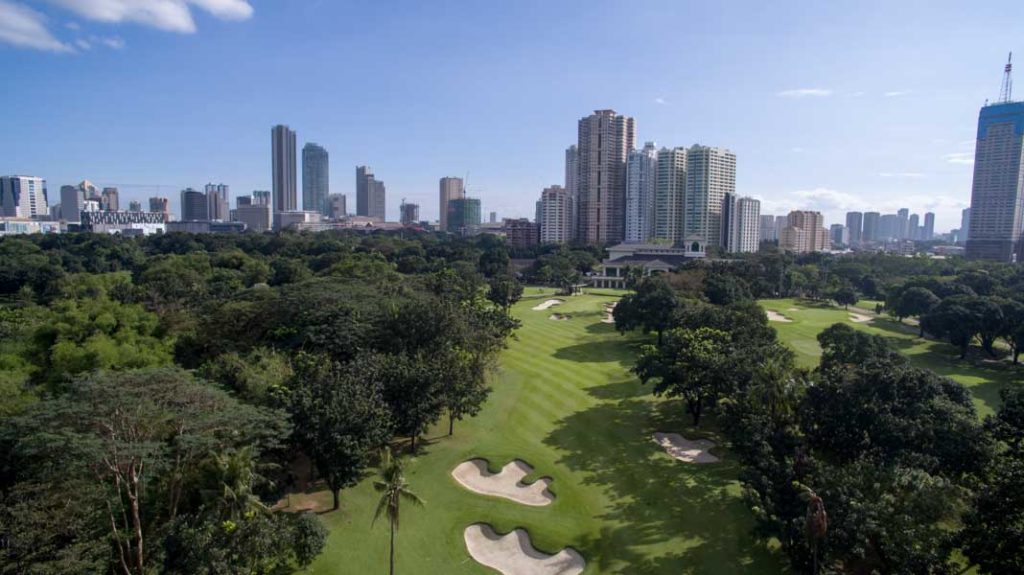 Wack Wack Golf and Country Club, mature tree lined fairway in Mandaluyong, Metro Manila, Philippines