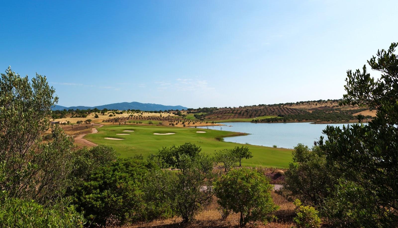 Alamos Golf Course, rolling Western Algarve fairways framed by umbrella pines near Portimao, Portugal
