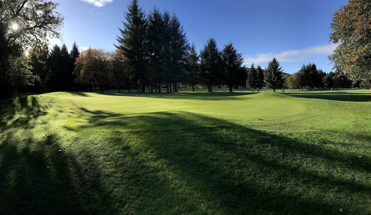 Duff House Royal Golf Club, flat parkland fairways and large two-tier greens beside the River Deveron at Banff, Aberdeenshire Scotland