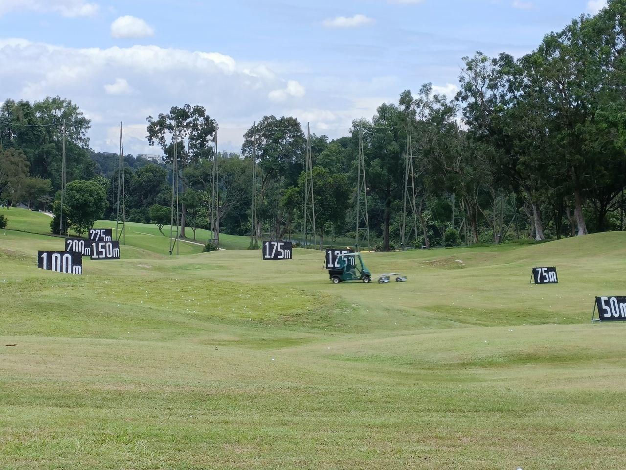 Keppel Club, the public Sime Course, tree lined parkland fairway in central Singapore