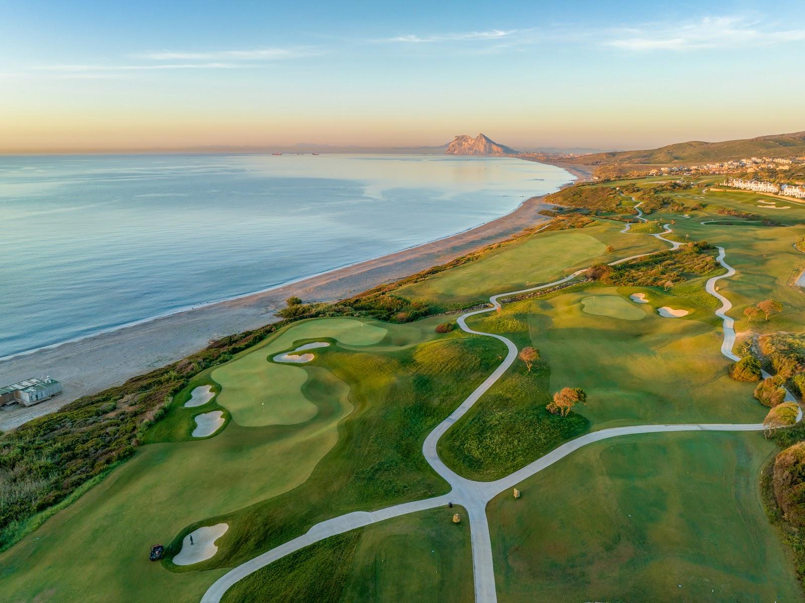 Alcaidesa Heathland at La Hacienda, elevated inland fairway with coastal views toward Gibraltar near San Roque, Spain