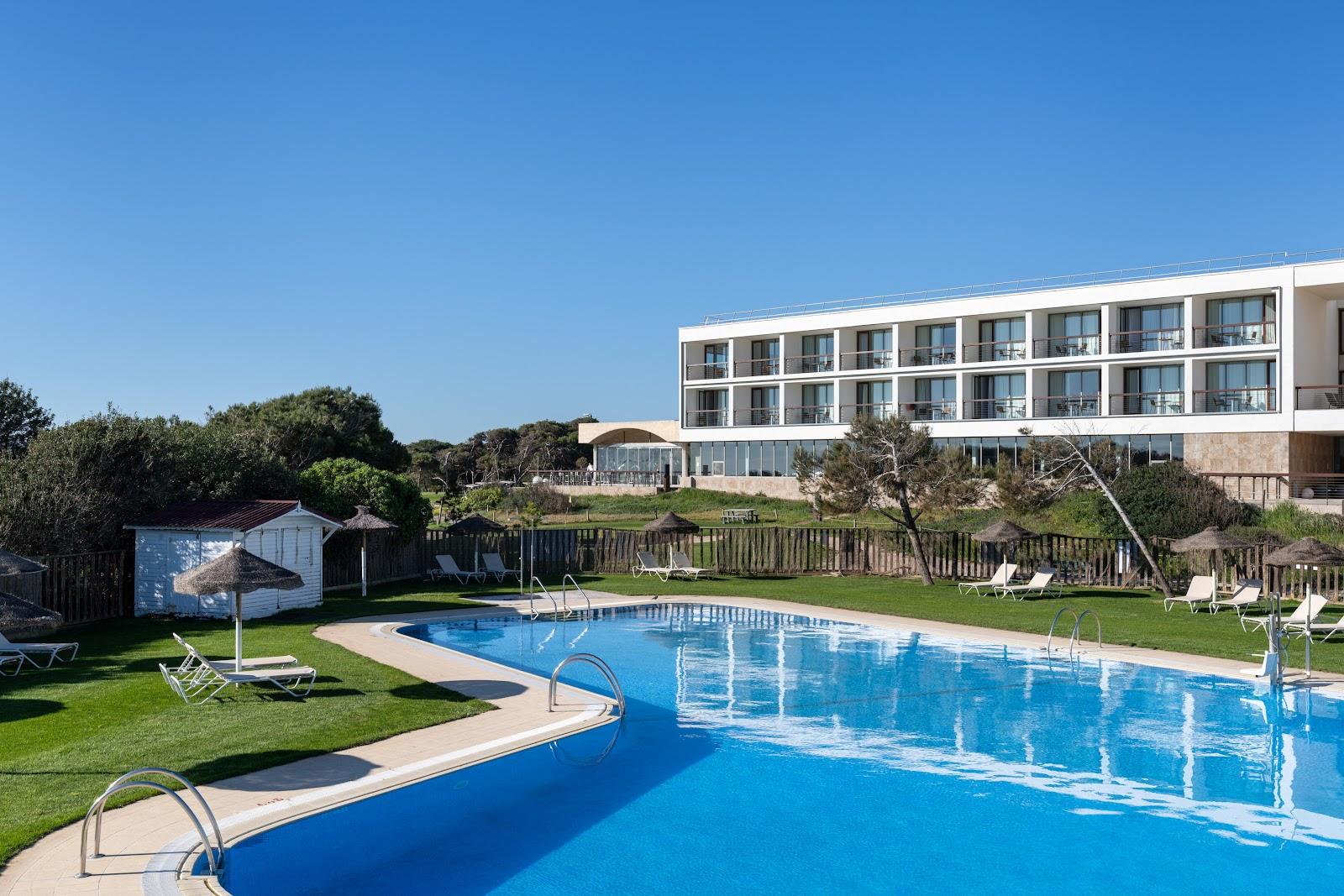 El Saler Parador golf course, Valencia, fairway running through umbrella pines toward the Mediterranean dunes