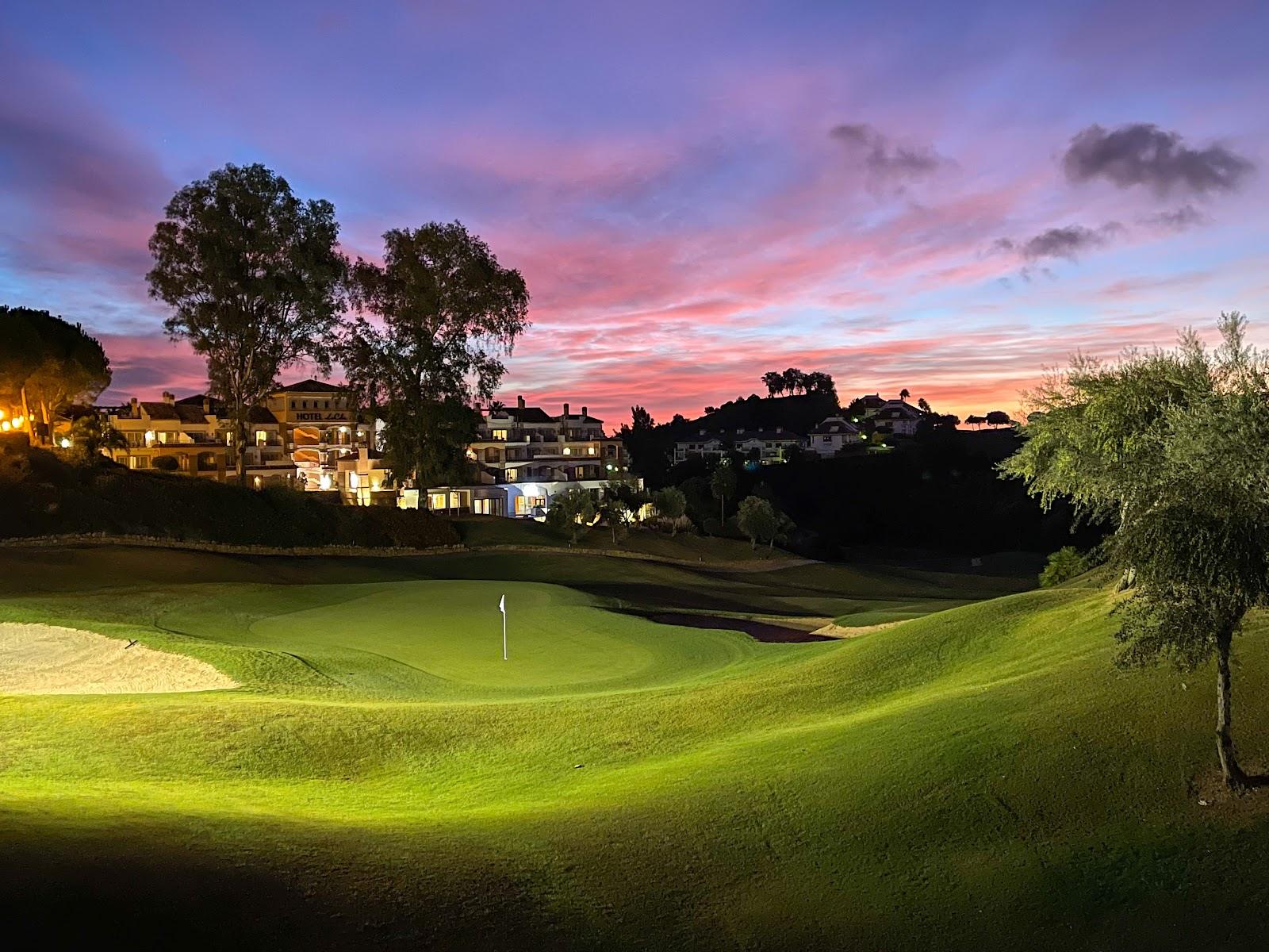 La Cala Europa course, fairway with the river Ojen in the hills near Mijas, Spain