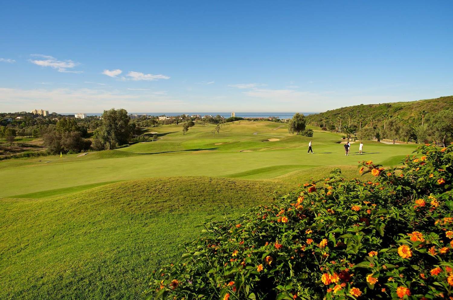 Marbella Golf Country Club, rolling fairway with sea views in the hills above Marbella, Spain