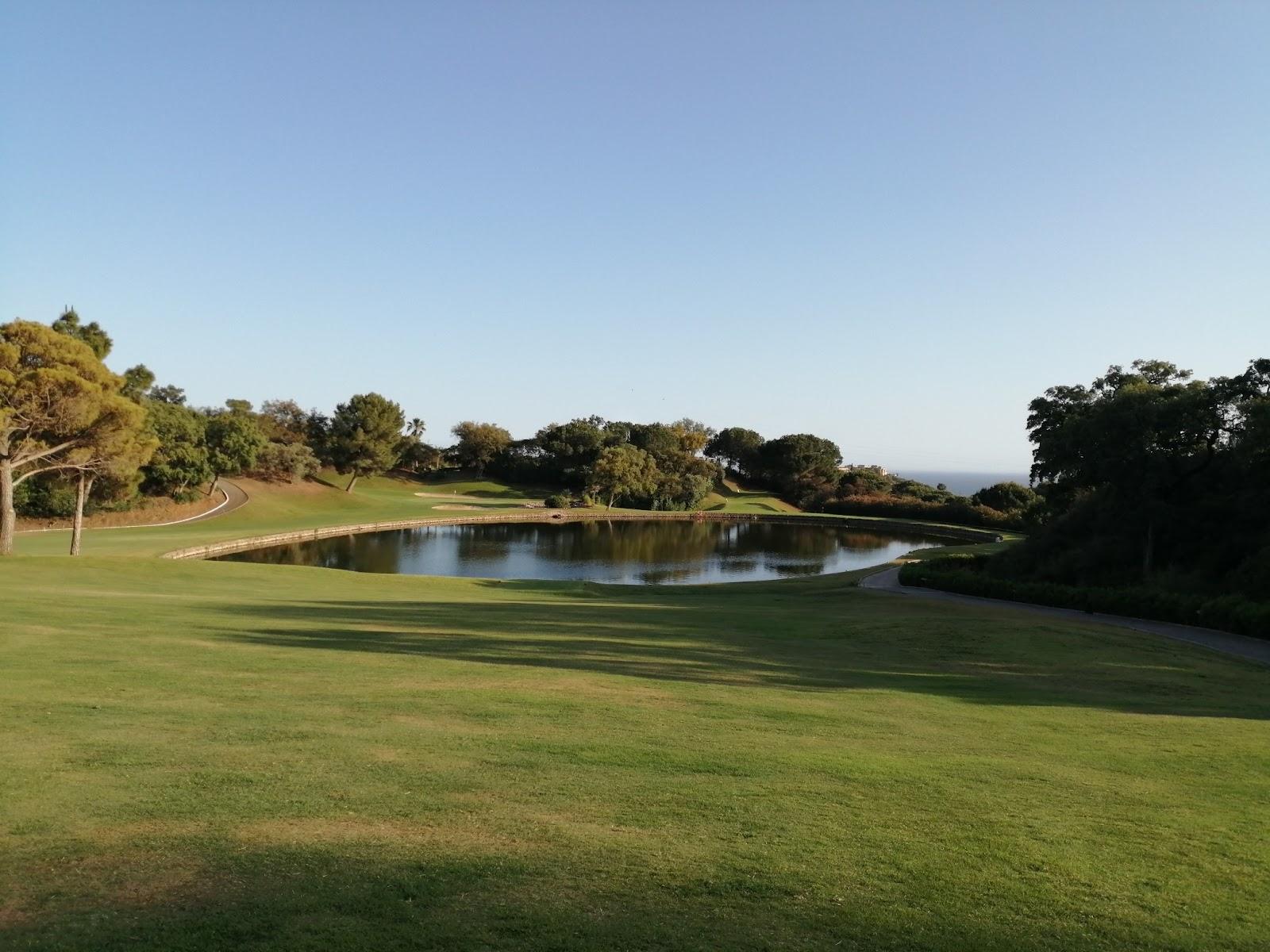 Santa Maria Golf, parkland fairway running through a wooded valley in Elviria, Marbella, Spain