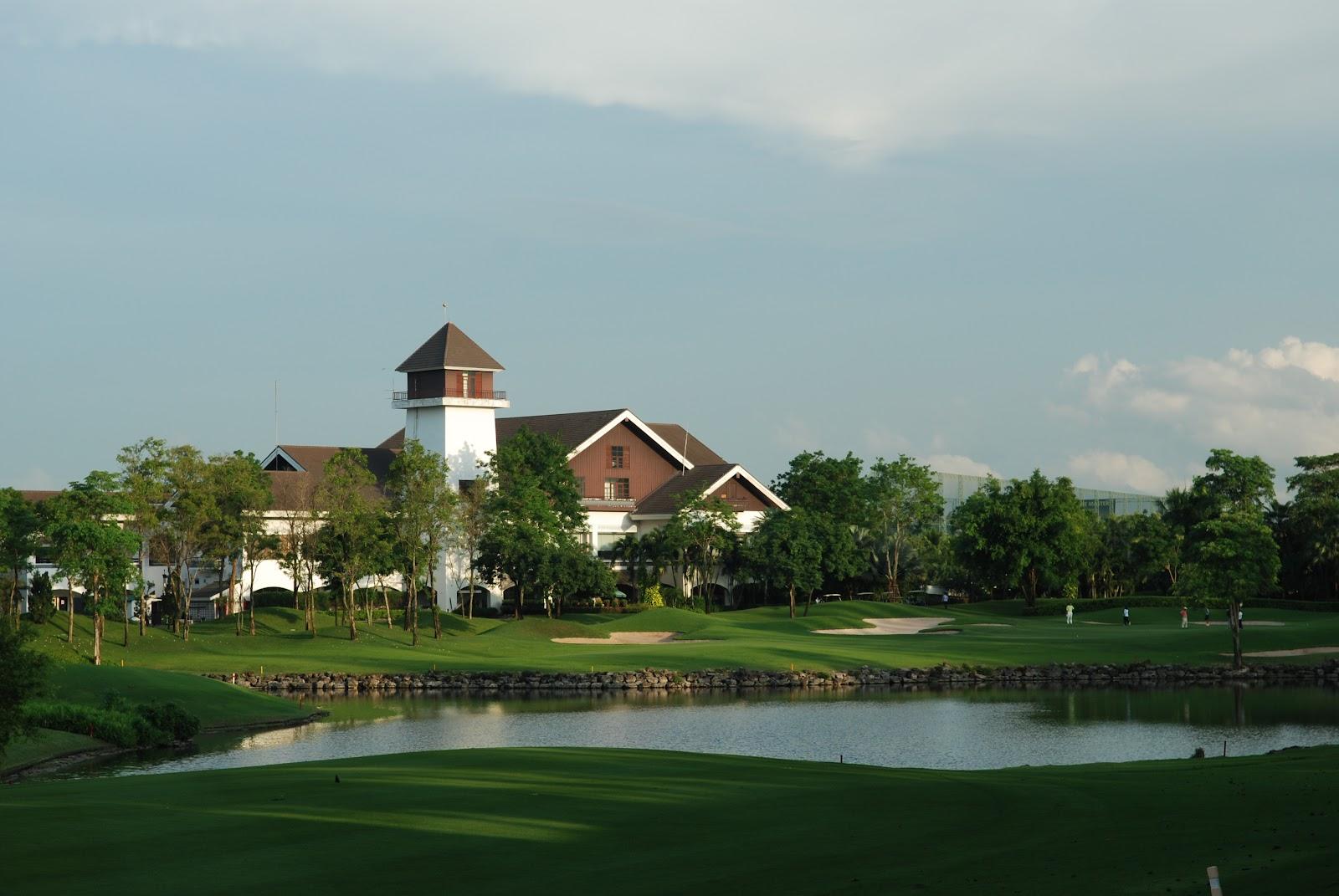 Alpine Golf and Sports Club, contoured fairway and water hazard near Bangkok, Thailand