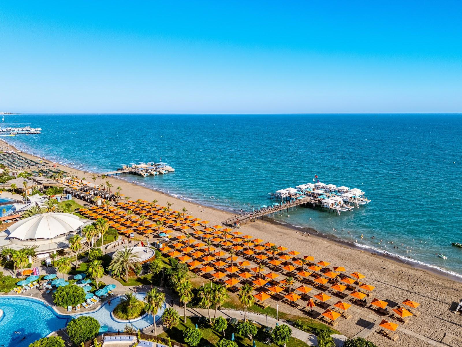 Kaya Palazzo Golf Club, Belek fairway framed by umbrella pines and a lake on the Antalya coast, Turkey