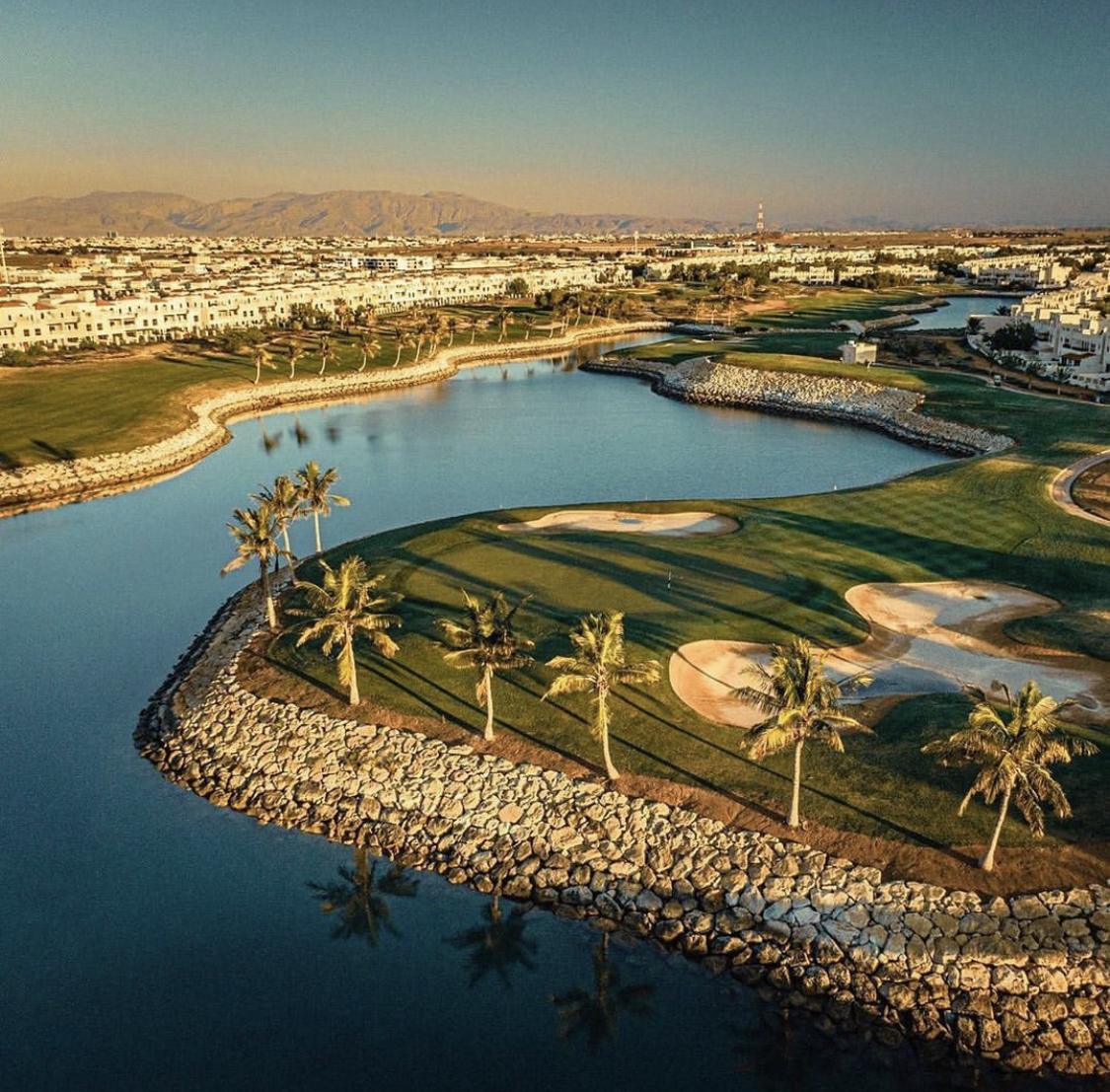 Al Hamra Golf Club, fairways winding between interconnected lagoons on the Arabian Gulf coast at Ras Al Khaimah, United Arab Emirates