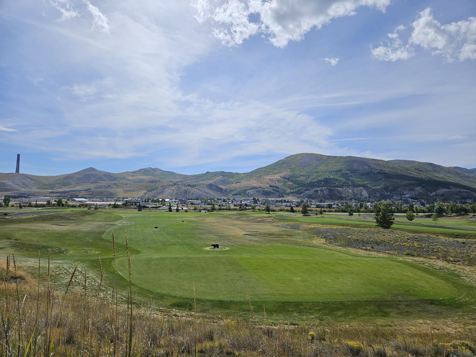 Old Works Golf Course, fairways and black slag bunkers on a reclaimed copper smelter in Anaconda, Montana