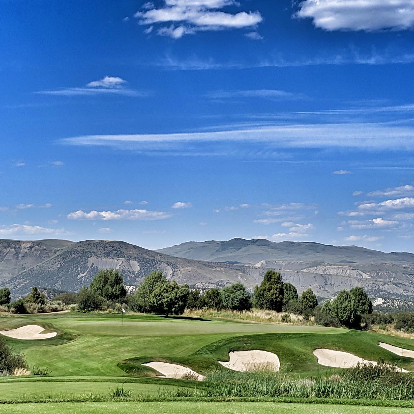 Red Sky Golf Club Fazio Course, mountain fairway rising through sage near Wolcott, Colorado